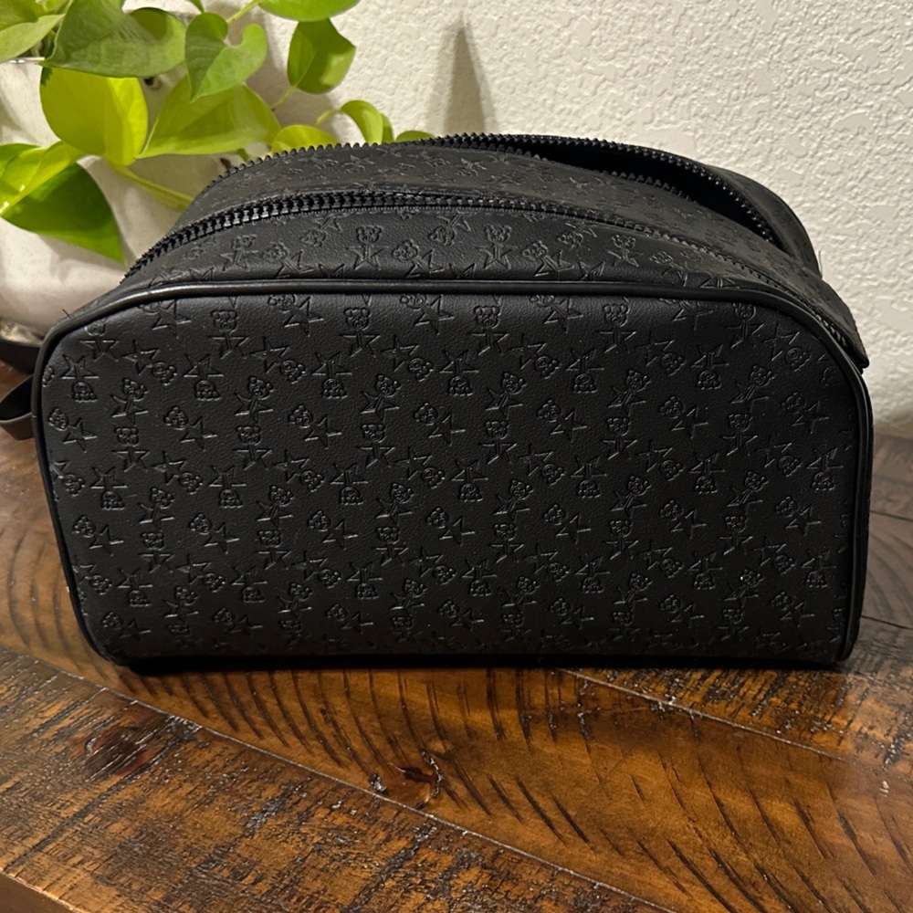 Jeffrey Star x Shane Dawson initial launch toiletry/ makeup bag in black.